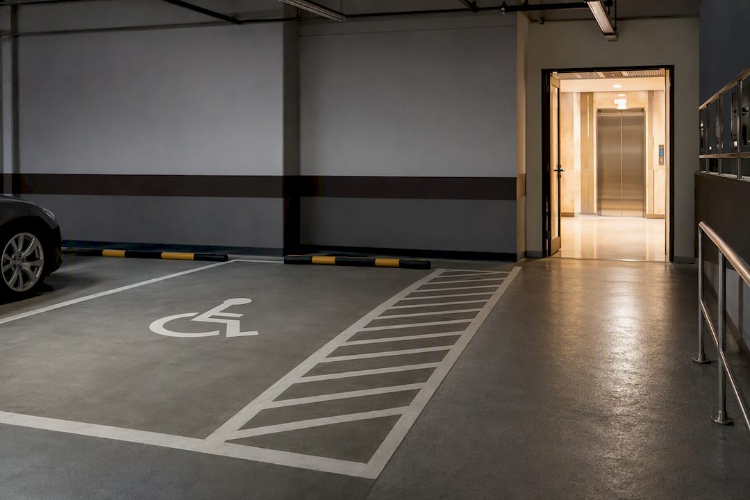 Accessible parking bay beside lift lobby